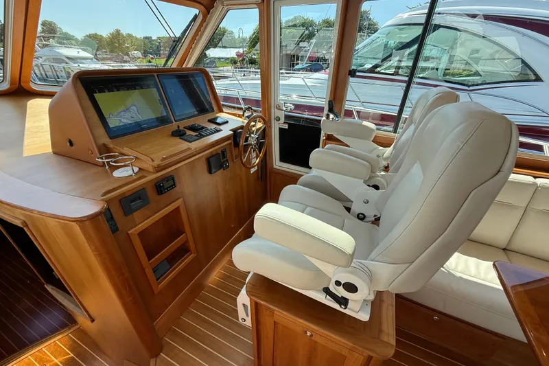 Slide: The Image of Luxurious interior of 2018 Sabre 45 Salon Express yacht with helm and seating. - 41