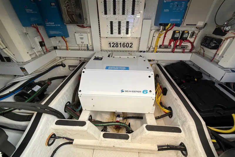 Slide: The Image of Engine room of 2018 Sabre 45 Salon Express with Seakeeper 6 stabilizer system. - 69