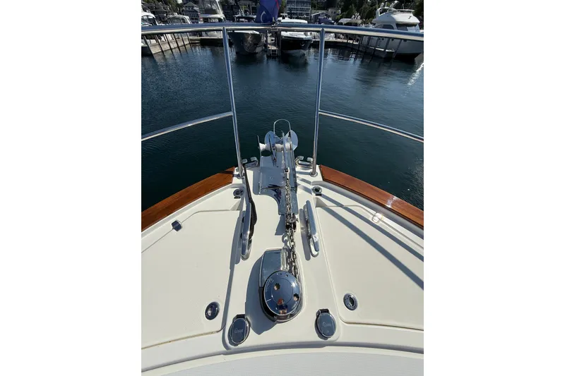 Slide: The Image of Bow view of 2018 Sabre 45 Salon Express yacht docked at marina. - 14