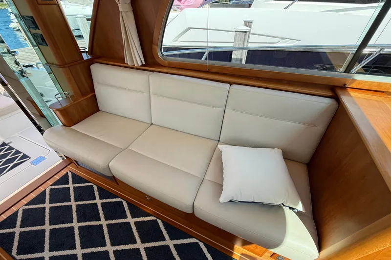 Slide: The Image of Luxurious interior of 2018 Sabre 45 Salon Express yacht with plush seating and elegant decor. - 37