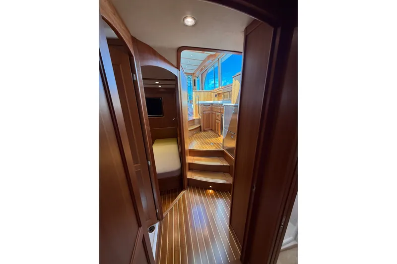 Slide: The Image of Interior view of 2018 Sabre 45 Salon Express yacht with wooden flooring and cabinetry. - 65