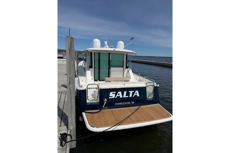 Slide: The Image of 2018 Sabre 45 Salon Express yacht docked at Charlevoix, MI marina. - 6