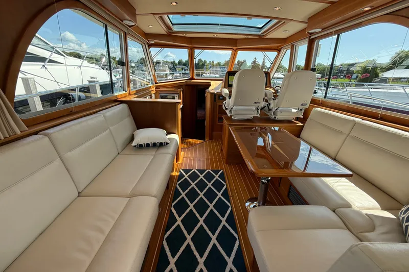 Slide: The Image of Luxurious interior of 2018 Sabre 45 Salon Express yacht with leather seating and wooden finishes. - 32