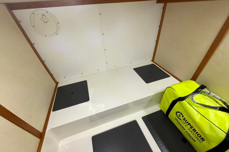 Slide: The Image of Interior of 2018 Sabre 45 Salon Express with safety equipment bag. - 66