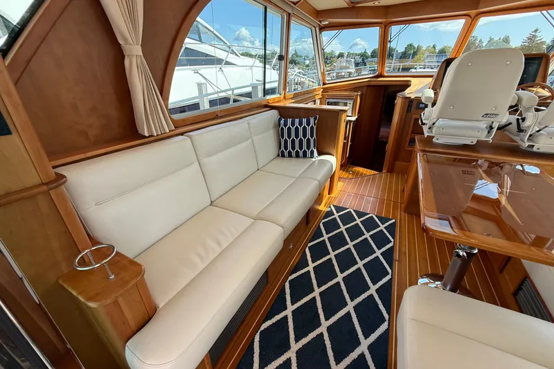 Slide: The Image of Luxurious interior of 2018 Sabre 45 Salon Express yacht with elegant seating and wooden finishes. - 33