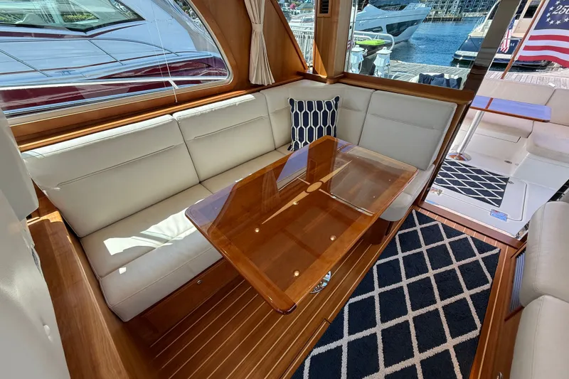Slide: The Image of Luxurious interior of 2018 Sabre 45 Salon Express yacht with elegant seating and wooden table. - 35