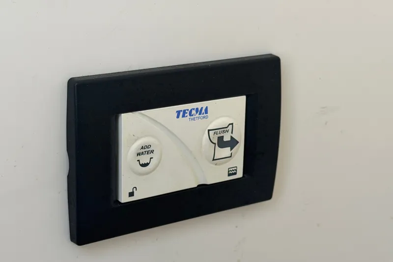 Slide: The Image of Control panel for Tecma toilet on 2019 Hurricane SunDeck 2400 OB boat. - 26