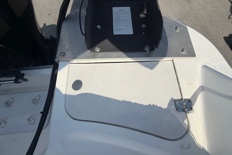 Slide: The Image of 2019 Hurricane SunDeck 2400 OB boat deck with hatch and hardware details. - 75