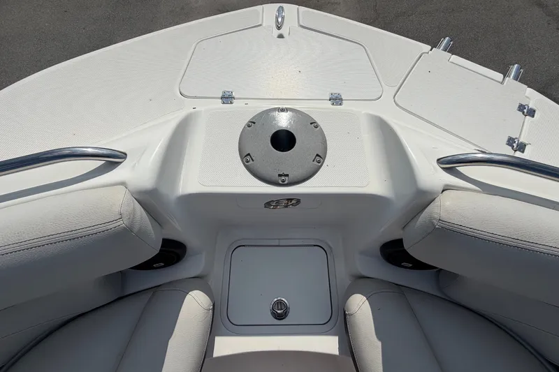 Slide: The Image of The image shows the bow deck of a 2019 Hurricane SunDeck 2400 OB with seating. - 46