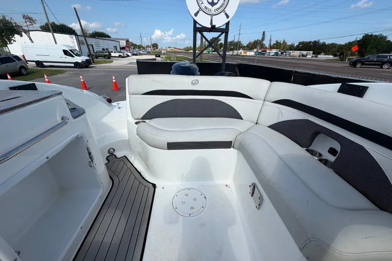Slide: The Image of 2019 Hurricane SunDeck 2400 OB boat interior with spacious seating and modern design. - 62