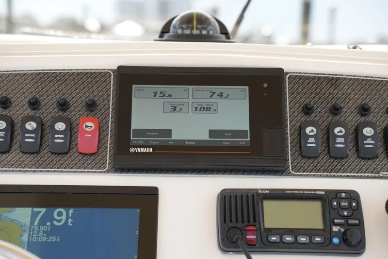 Slide: The Image of Dashboard of 2021 Grady-White 251 Coastal Explorer with Yamaha display and controls. - 19
