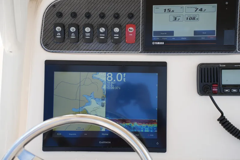 Slide: The Image of Dashboard of 2021 Grady-White 251 Coastal Explorer with Garmin navigation and Yamaha display. - 22