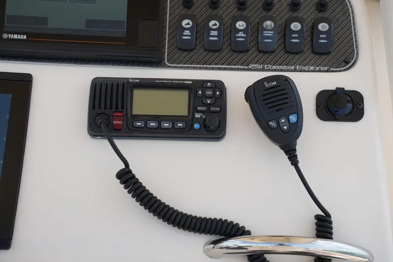 Slide: The Image of Control panel of 2021 Grady-White 251 Coastal Explorer with Icom marine radio. - 23