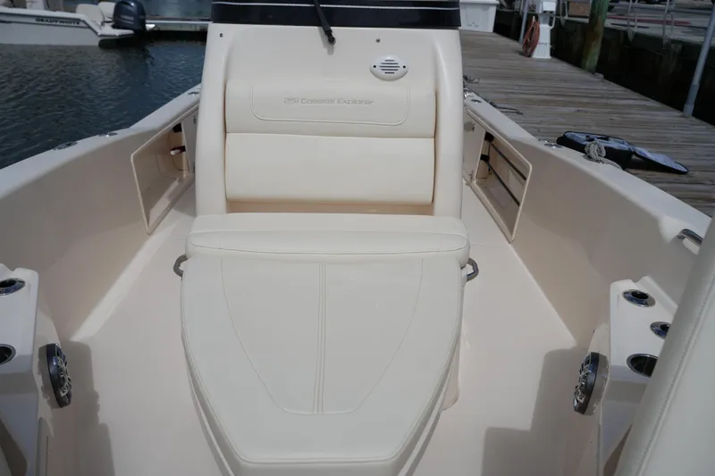 Slide: The Image of 2021 Grady-White 251 Coastal Explorer boat interior with cushioned seating and sleek design. - 29