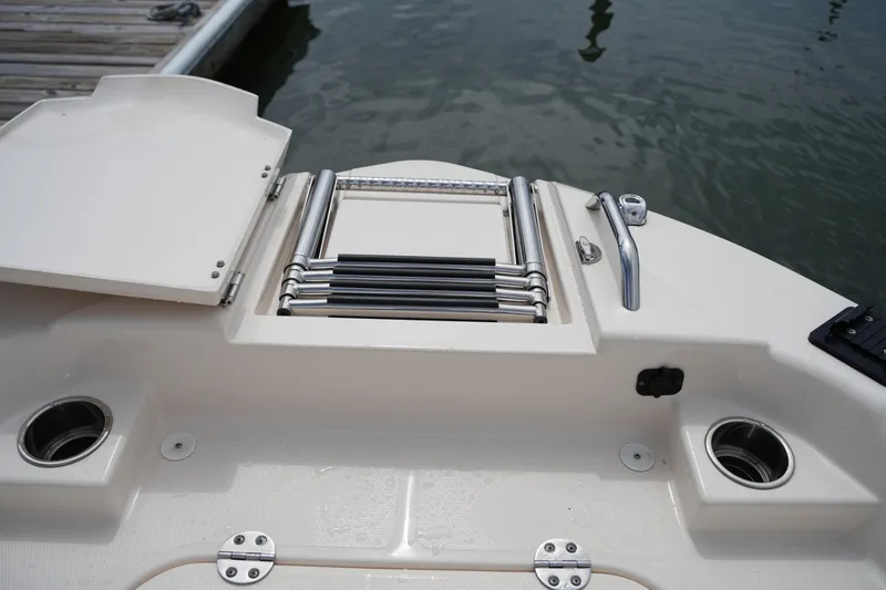 Slide: The Image of 2021 Grady-White 251 Coastal Explorer boat ladder and deck details at dock. - 33