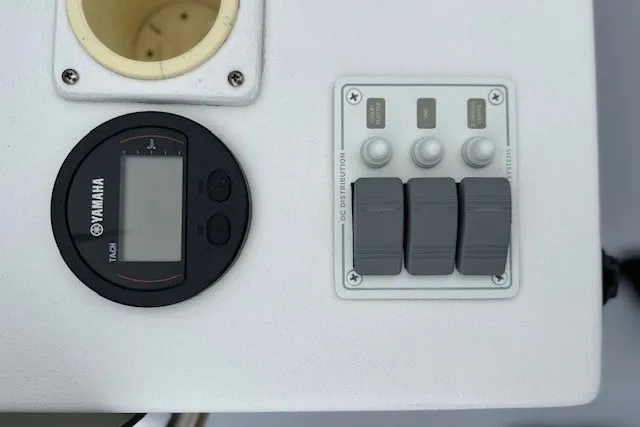 Slide: The Image of Control panel of a 1975 F L Tripp & Sons 18 Center Console boat. - 6
