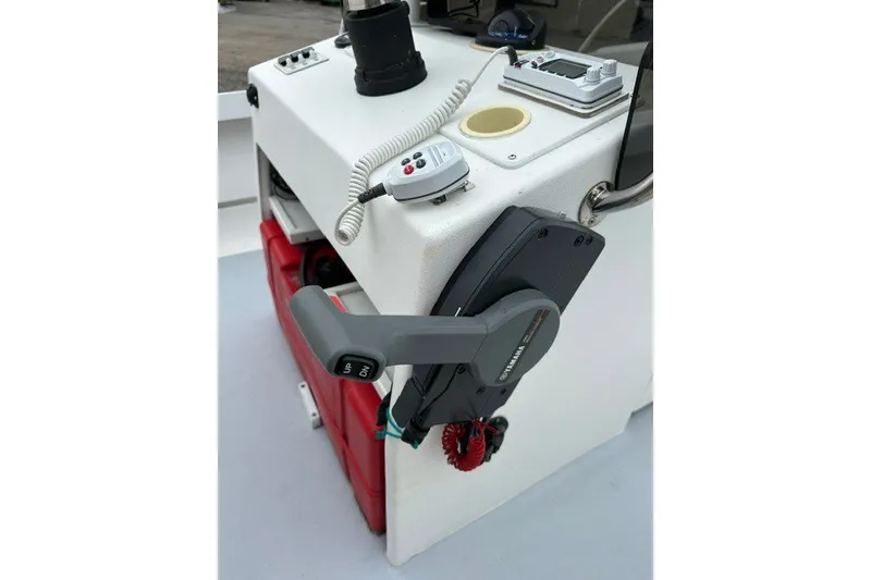 Slide: The Image of 1975 F L Tripp & Sons 18 Center Console boat controls with Yamaha throttle. - 10