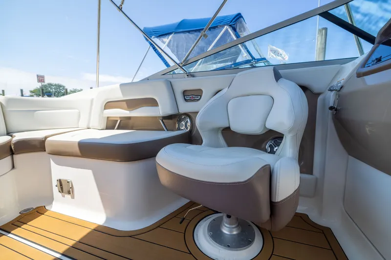 Slide: The Image of Interior of 2015 Chaparral 246 SSi boat with plush seating and modern design. - 14