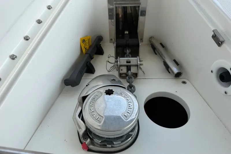 Slide: The Image of Anchor compartment of 2021 Formula 430 Super Sport Crossover boat, featuring Lewmar windlass. - 51