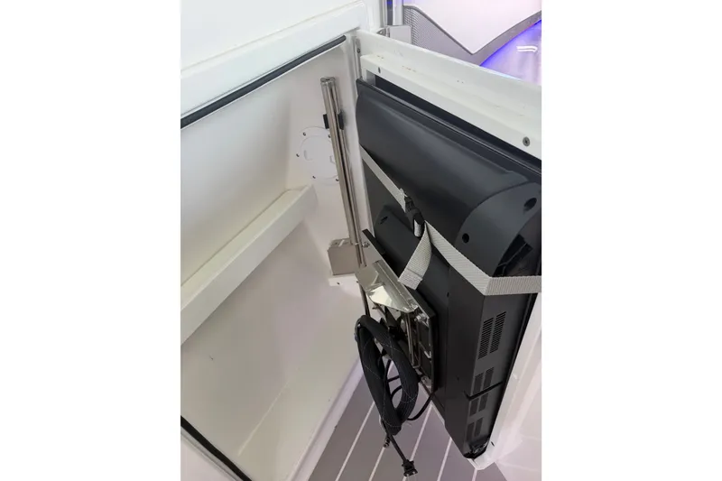 Slide: The Image of Storage compartment in a 2021 Formula 430 Super Sport Crossover boat. - 58