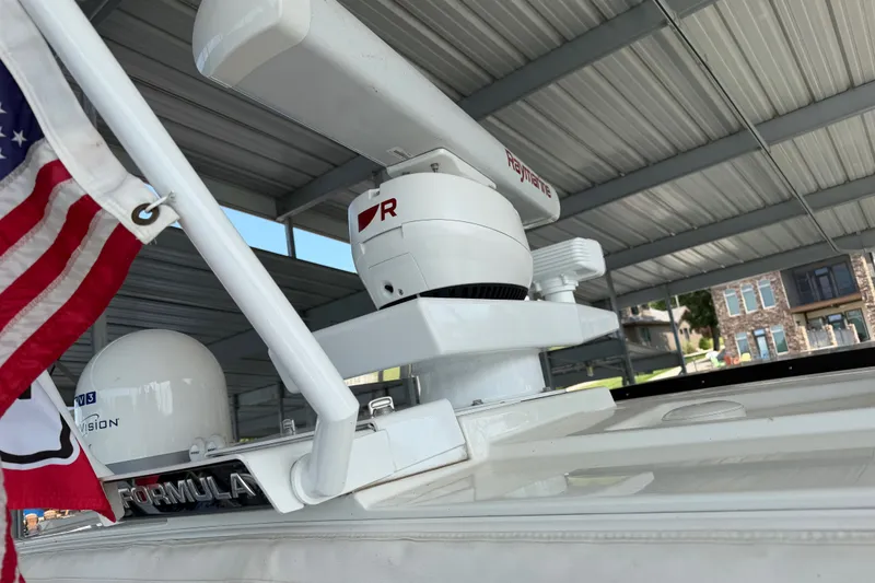 Slide: The Image of 2021 Formula 430 Super Sport Crossover with radar equipment and American flag. - 34