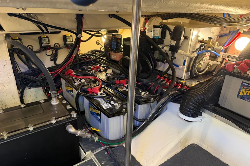 Slide: The Image of Engine room of 2021 Formula 430 Super Sport Crossover with batteries and wiring. - 32