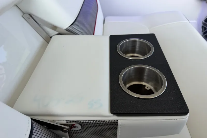 Slide: The Image of 2021 Formula 430 Super Sport Crossover interior with dual cup holders. - 54