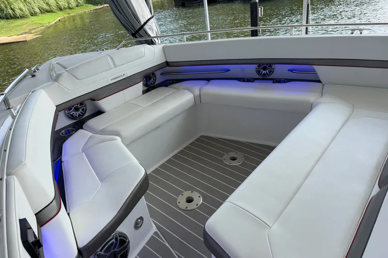 Slide: The Image of Luxurious seating area on a 2021 Formula 430 Super Sport Crossover boat. - 56