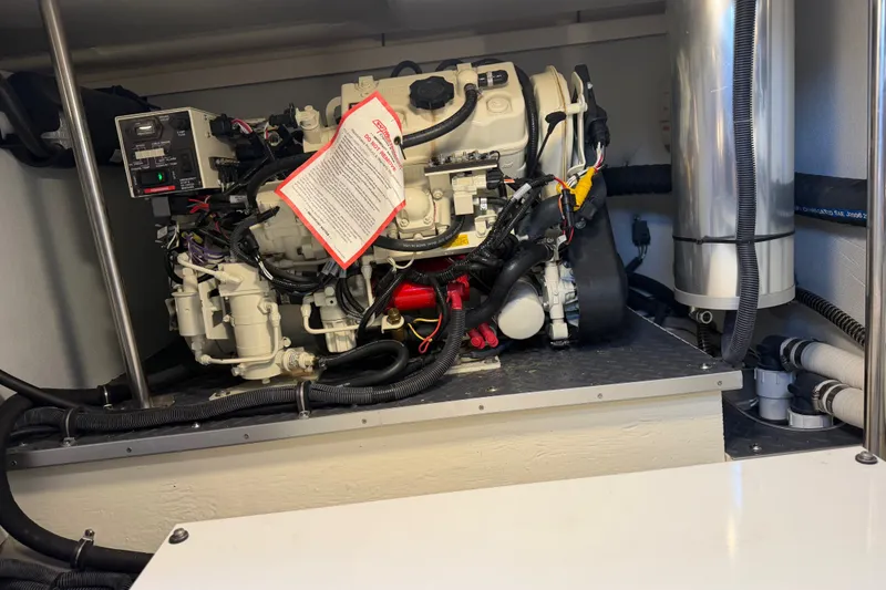Slide: The Image of Engine room of a 2021 Formula 430 Super Sport Crossover boat, showcasing machinery and components. - 30