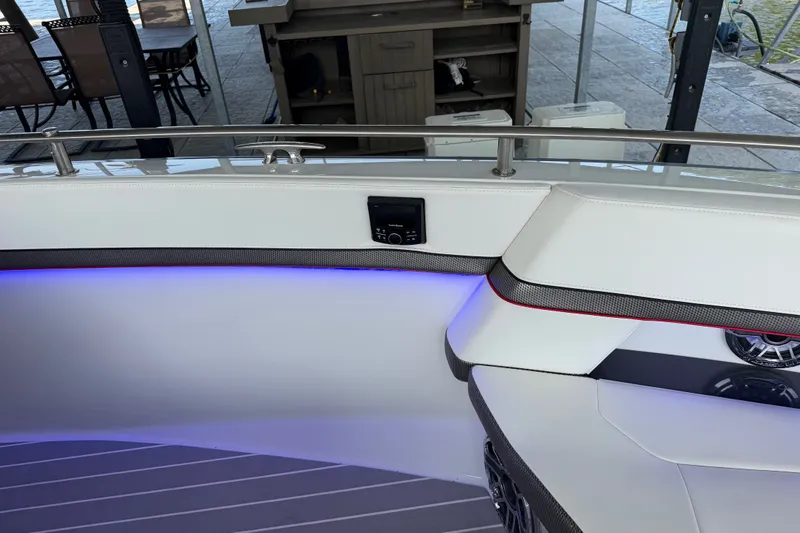 Slide: The Image of Interior of 2021 Formula 430 Super Sport Crossover boat with modern seating and ambient lighting. - 52