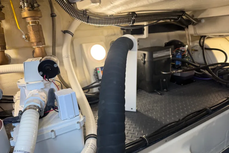 Slide: The Image of Engine room of 2021 Formula 430 Super Sport Crossover with visible wiring and components. - 31