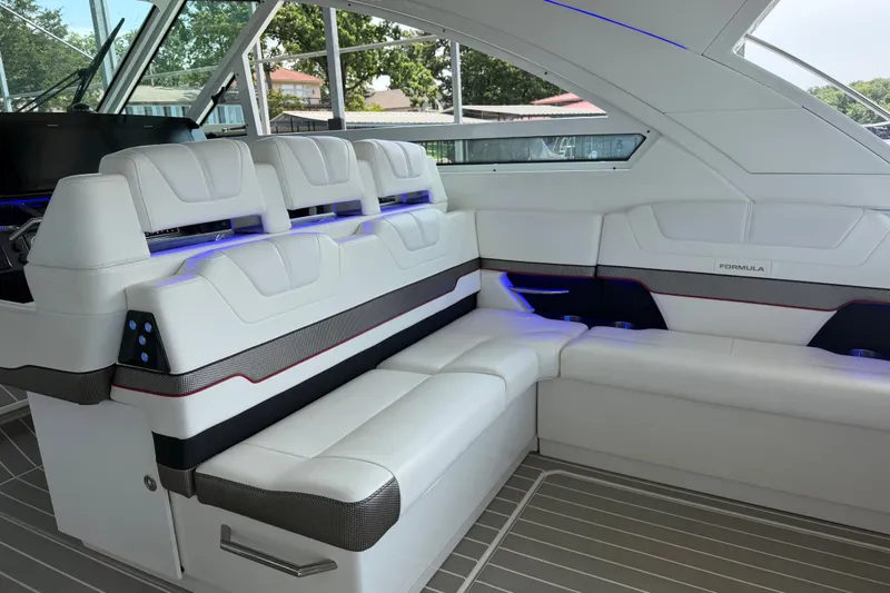 Slide: The Image of Luxurious interior of 2021 Formula 430 Super Sport Crossover with white seating and ambient lighting. - 64