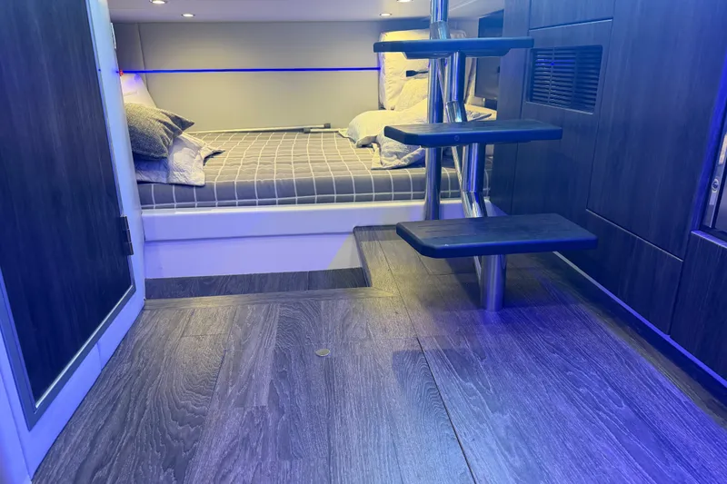 Slide: The Image of Interior of 2021 Formula 430 Super Sport Crossover with modern design and cozy sleeping area. - 48