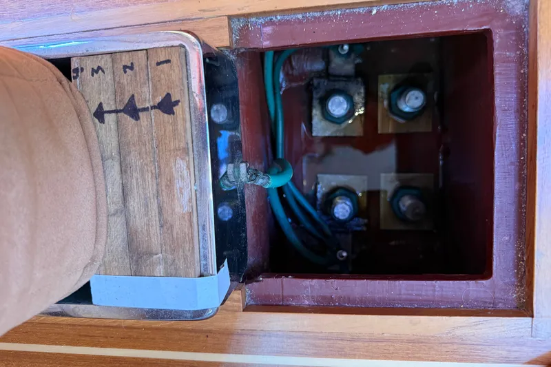 Slide: The Image of Electrical panel inside a 2009 Sabre 386 boat, showing wiring and connections. - 108