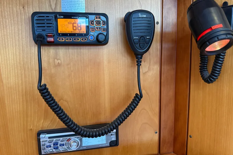 Slide: The Image of Marine radio and stereo system on a 2009 Sabre 386 yacht's wooden interior panel. - 19