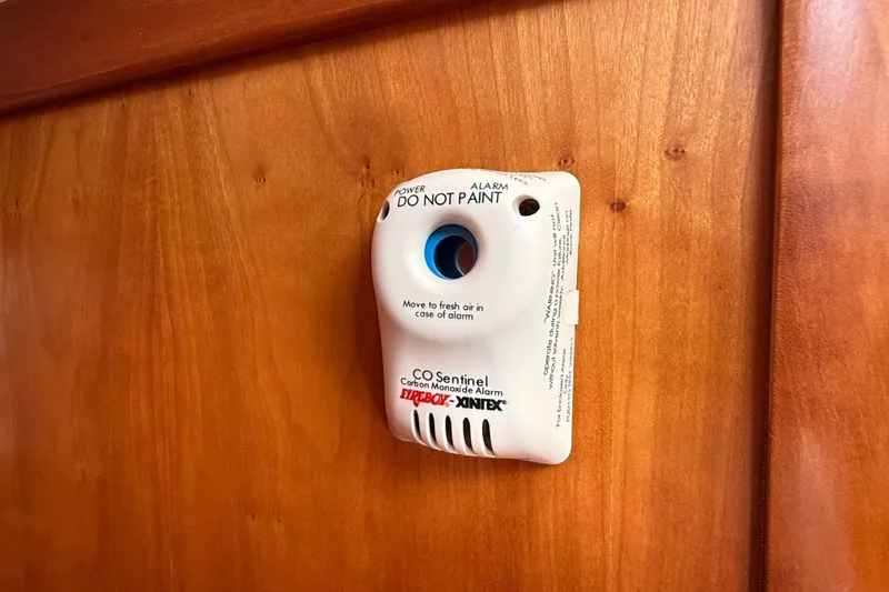 Slide: The Image of Carbon monoxide alarm on wooden panel in 2009 Sabre 386 boat interior. - 47