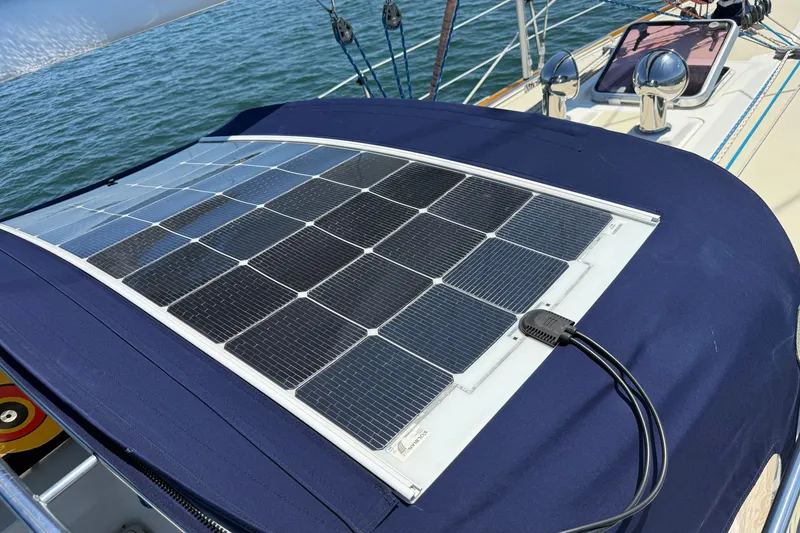 Slide: The Image of Solar panel on a 2009 Sabre 386 sailboat, harnessing renewable energy at sea. - 101