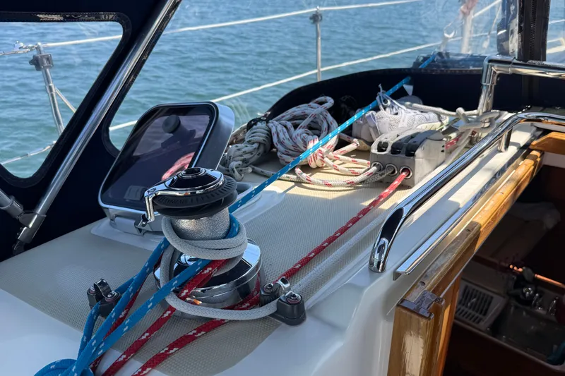 Slide: The Image of Sailing yacht Sabre 386 (2009) cockpit with ropes and winch, on calm water. - 82