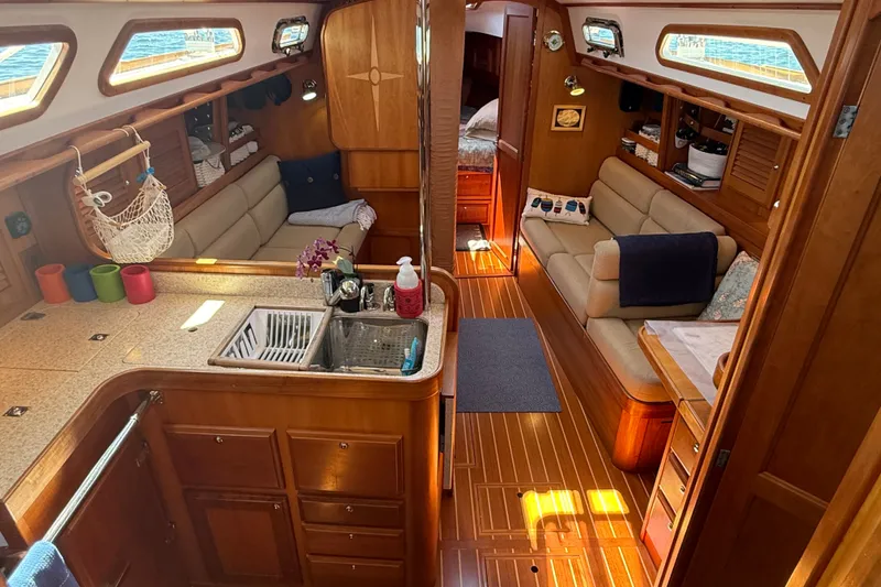 Slide: The Image of Luxurious interior of 2009 Sabre 386 sailboat with cozy seating and elegant wood finishes. - 22