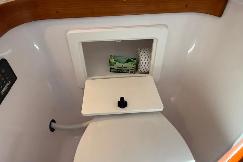 Slide: The Image of Compact marine toilet with storage compartment in 2009 Sabre 386 sailboat. - 56
