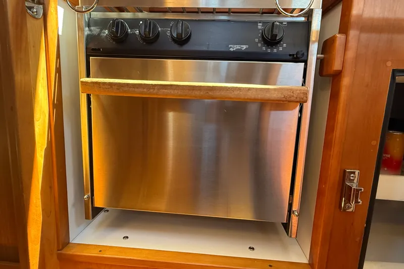 Slide: The Image of Stainless steel oven in a 2009 Sabre 386 yacht kitchen. - 32