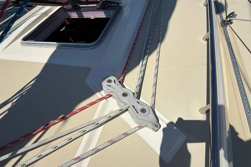 Slide: The Image of Deck of 2009 Sabre 386 sailboat with ropes and open hatch. - 72
