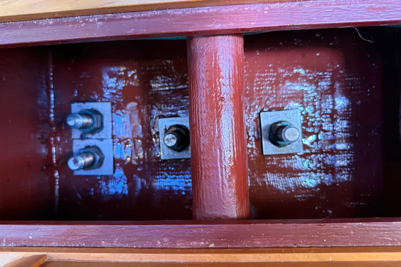 Slide: The Image of Interior view of a 2009 Sabre 386 sailboat keel bolts and structure. - 106