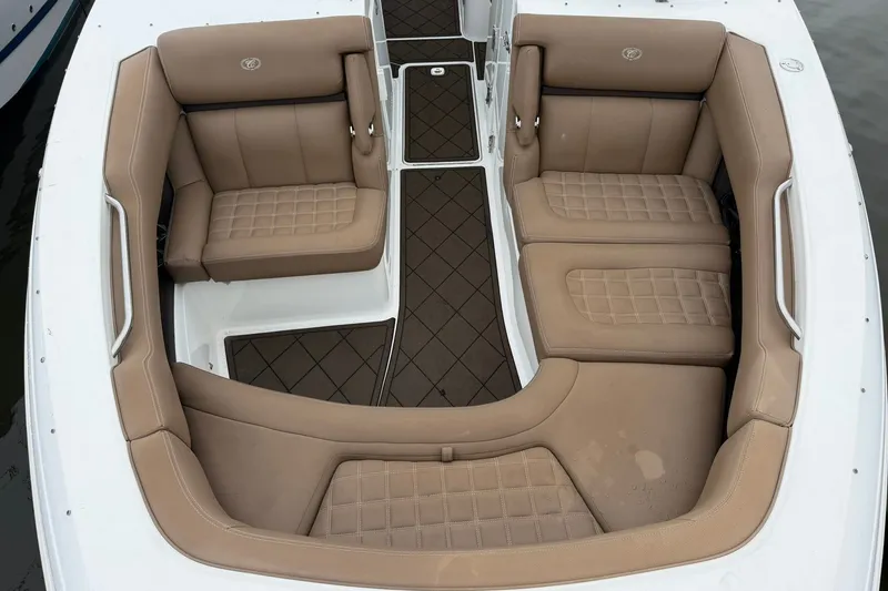 Slide: The Image of Luxurious seating area on a 2020 Cobalt 30SC boat with tan upholstery. - 8