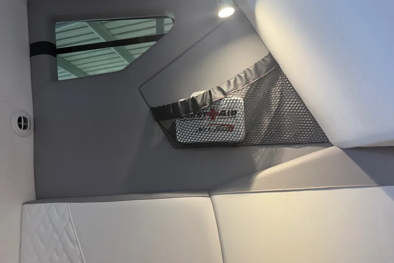 Slide: The Image of Interior of 2027 Nor-Tech 42 Eleven boat with netted storage and modern design. - 69