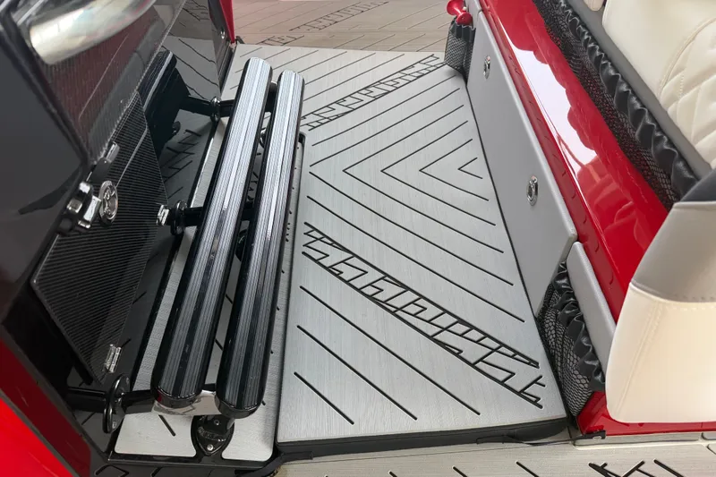 Slide: The Image of Interior of 2027 Nor-Tech 42 Eleven boat with sleek, modern design and textured flooring. - 51
