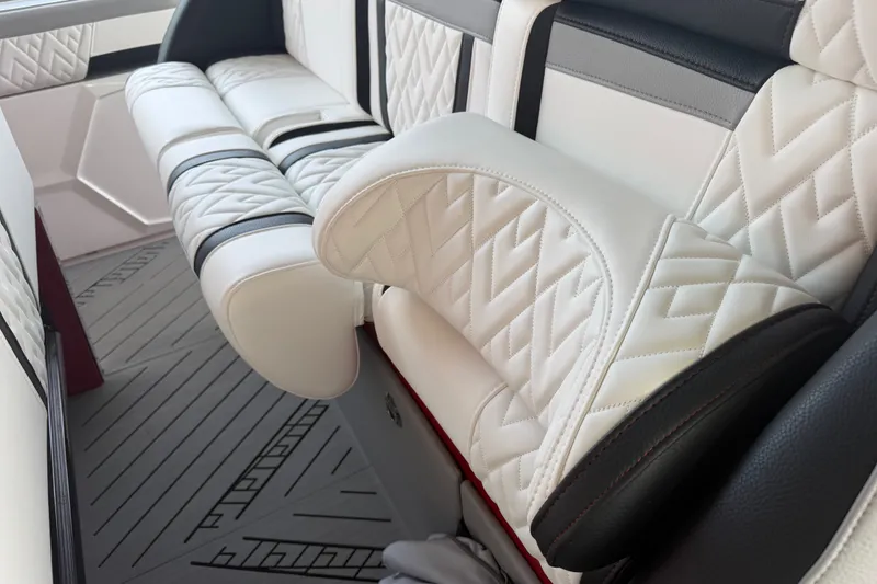 Slide: The Image of Luxurious white leather seating in 2027 Nor-Tech 42 Eleven boat interior. - 45