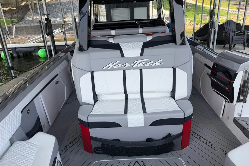 Slide: The Image of 2027 Nor-Tech 42 Eleven boat interior with stylish seating and modern design. - 36