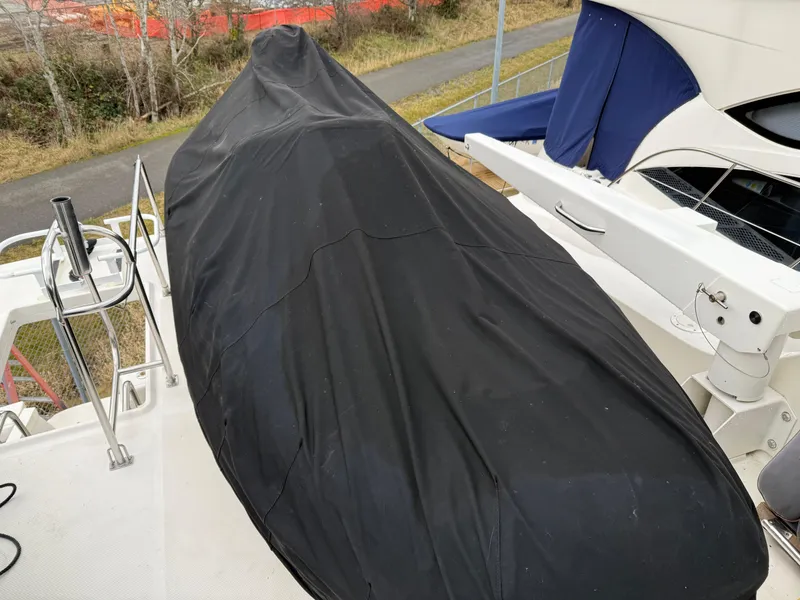 Slide: The Image of Covered boat on a 2003 Meridian 490 Pilothouse deck. - 50