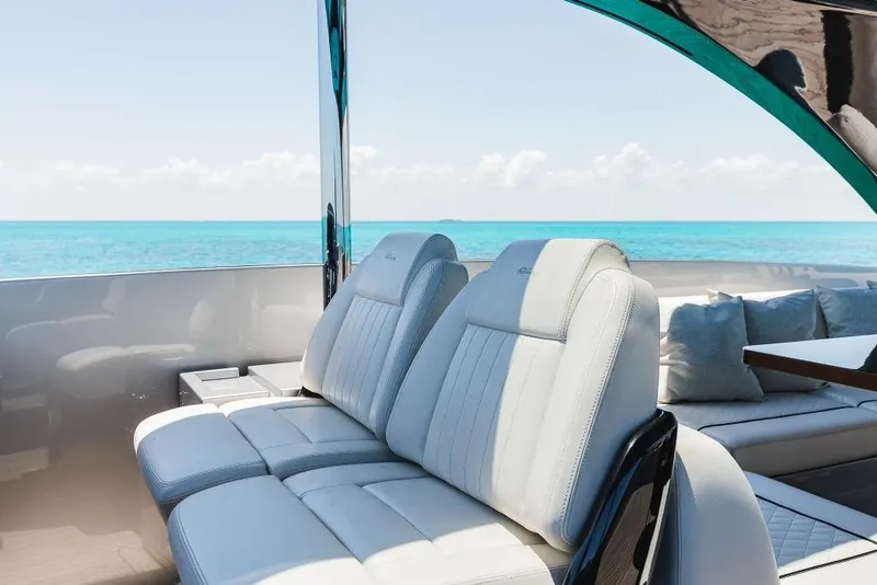 Slide: The Image of Luxurious seating on a 2022 Riva 90' Argo yacht with ocean view. - 41